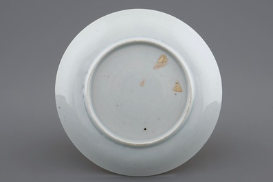 A Chinese famille rose eggshell cup and saucer with butterflies among flowers, Yongzheng, 1723-1735