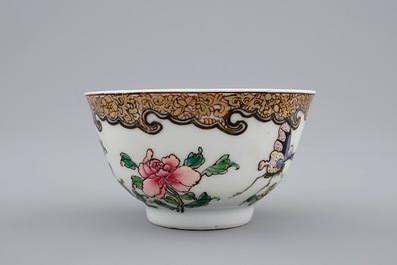 A Chinese famille rose eggshell cup and saucer with butterflies among flowers, Yongzheng, 1723-1735