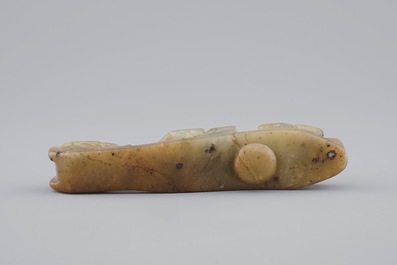 A Chinese mottled jade belt hook, 20th C.
