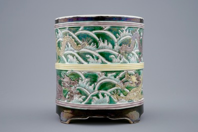 A Chinese famille noire brush pot with dragons, 19/20th C.
