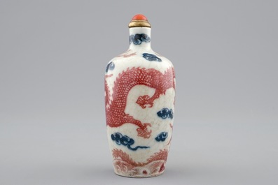 A Chinese blue, white and underglaze red snuff bottle, 18/19th C.