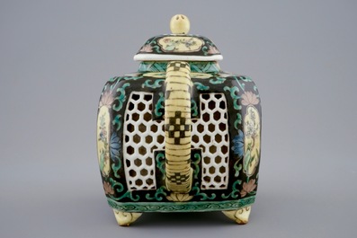 A double-walled reticulated Chinese famille noire teapot, 18/19th C.