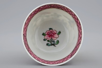 A Chinese famille rose eggshell cup and saucer with butterflies among flowers, Yongzheng, 1723-1735