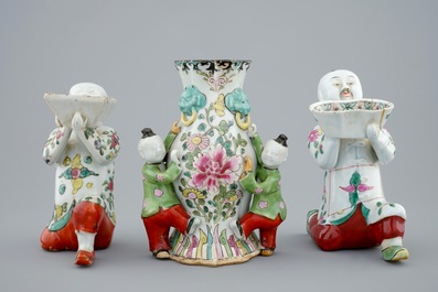 Two Chinese famille rose figures and a wall vase, 18/19th C.