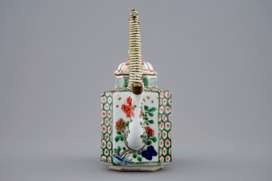 A Chinese famille verte teapot and a plate with fish, Kangxi