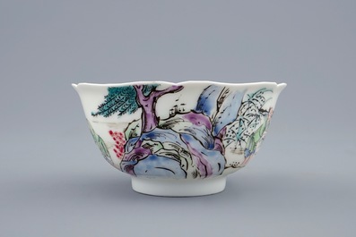Een Chinese famille rose kop en schotel met decor van de visvangst, Yongzheng, 1723-1735