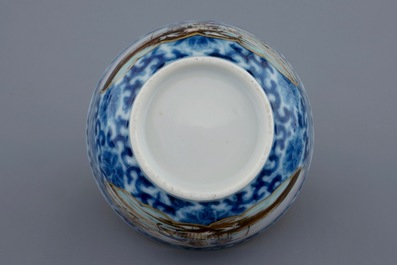 A Chinese export porcelain cup and saucer with a fish seller, Qianlong, 18th C.