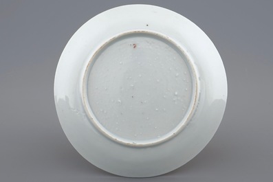 A Chinese famille rose eggshell cup and saucer with butterflies among flowers, Yongzheng, 1723-1735