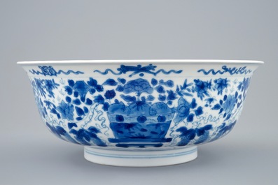 A Chinese blue and white dragon bowl with floral design, Kangxi