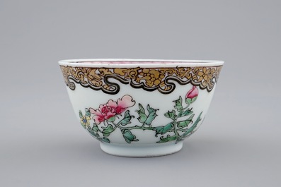 A Chinese famille rose eggshell cup and saucer with butterflies among flowers, Yongzheng, 1723-1735