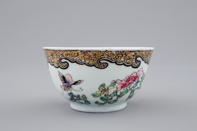 A Chinese famille rose eggshell cup and saucer with butterflies among flowers, Yongzheng, 1723-1735