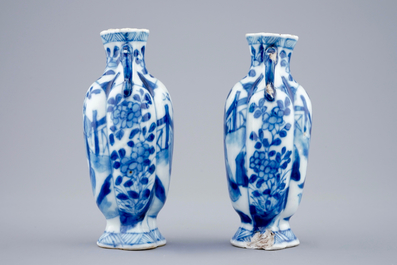 A pair of small Chinese blue and white vases with long Elizas, Kangxi