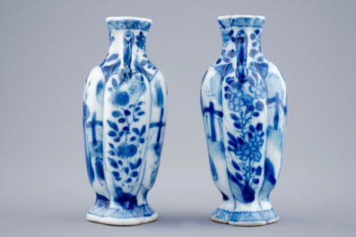 A pair of small Chinese blue and white vases with long Elizas, Kangxi