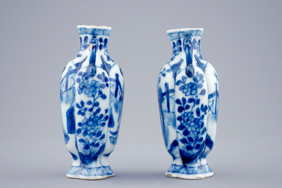 A pair of small Chinese blue and white vases with long Elizas, Kangxi