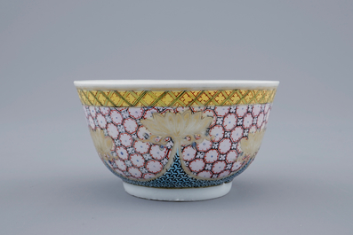 A Chinese famille rose eggshell cup and saucer with a central flowervase, Yongzheng, 1723-1735