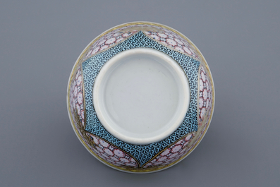 A Chinese famille rose eggshell cup and saucer with a central flowervase, Yongzheng, 1723-1735