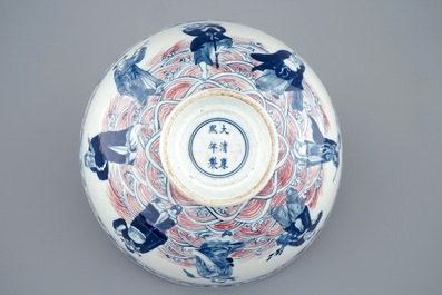 A Chinese blue, white and underglaze red bowl with immortals, 19/20th C.