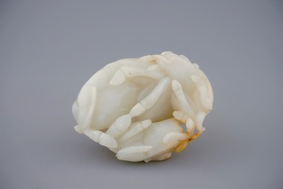 A Chinese white jade carving of a "Three rams" group, 19/20th C.