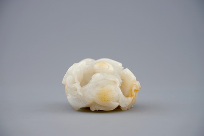 A Chinese white jade carving of a "Three rams" group, 19/20th C.