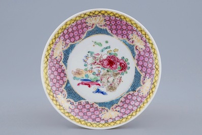 A Chinese famille eggshell rose cup and saucer with a central flowervase, Yongzheng, 1723-1735
