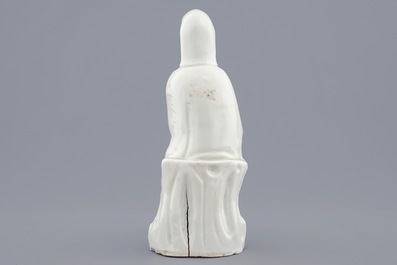 A Chinese Dehua blanc de Chine model of Guanyin with child, 19th C.