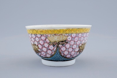 A Chinese famille eggshell rose cup and saucer with a central flowervase, Yongzheng, 1723-1735