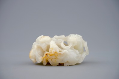 A Chinese white jade carving of a "Three rams" group, 19/20th C.