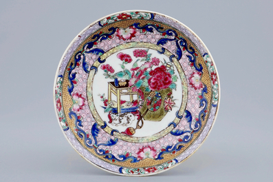 A Chinese famille rose eggshell cup and saucer with a cat, Yongzheng, 1723-1735