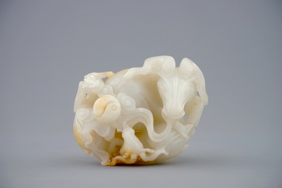 A Chinese white jade carving of a "Three rams" group, 19/20th C.