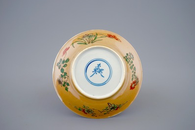 A Chinese famille verte caf&eacute; au lait ground cup and saucer, Kangxi