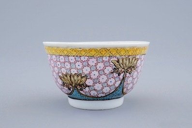 A Chinese famille eggshell rose cup and saucer with a central flowervase, Yongzheng, 1723-1735