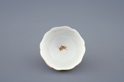 A Chinese grisaille and gilt cup and saucer with ducks and insects, Yongzheng, 1723-1735