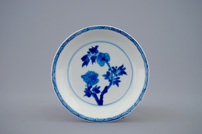 A Chinese famille verte caf&eacute; au lait ground cup and saucer, Kangxi