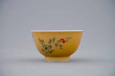 A Chinese famille verte caf&eacute; au lait ground cup and saucer, Kangxi
