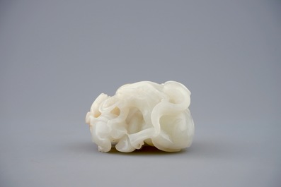 A Chinese white jade carving of a "Three rams" group, 19/20th C.