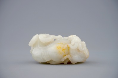 A Chinese white jade carving of a "Three rams" group, 19/20th C.