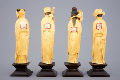 Un ensemble de 8 "Immortels" en ivoire sculpt&eacute; sur socles en bois, 19&egrave;me