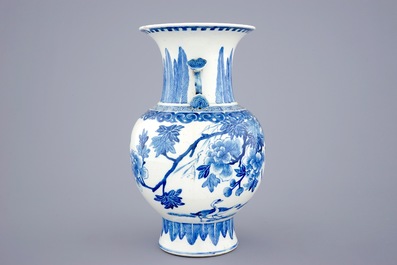 A Chinese blue and white vase with ruyi handles and a Kangxi-style plate, 19th C.