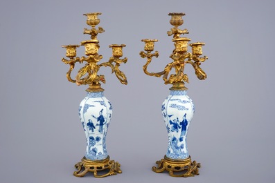 A pair of ormolu-mounted candelabra blue and white Chinese vases, Kangxi