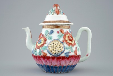 A Chinese moulded and applied famille rose teapot and cover on stand, Yongzheng, 1723-1735
