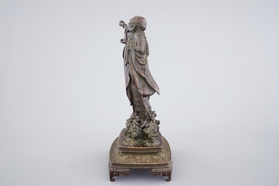 A fine Japanese bronze figure of a sage on base, Meiji, 19th C.