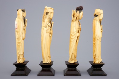Un ensemble de 8 "Immortels" en ivoire sculpt&eacute; sur socles en bois, 19&egrave;me