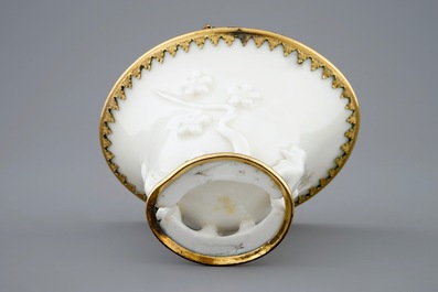 A Chinese blanc de Chine libation cup with gilt bronze mounts, Kangxi