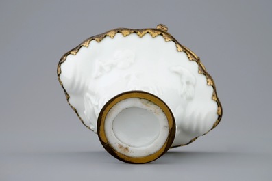 A Chinese blanc de Chine libation cup with gilt bronze mounts, Kangxi