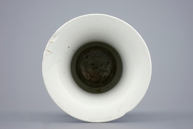 A Chinese blue and white vase with ruyi handles and a Kangxi-style plate, 19th C.