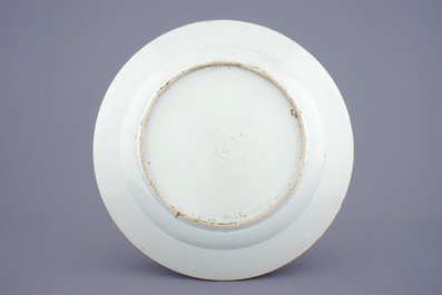 A massive blue and white Chinese charger with a punishment scene, Yongzheng/Qianlong
