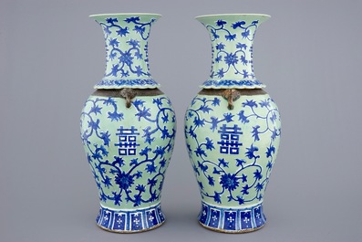 Een paar Chinese blauw-wit op celadon fond vazen met lotus scrolls, 19e eeuw