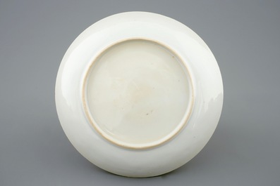 A Chinese relief-decorated famille rose cup and saucer with squirrels, Yongzheng, 1723-1735