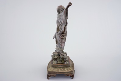 A fine Japanese bronze figure of a sage on base, Meiji, 19th C.