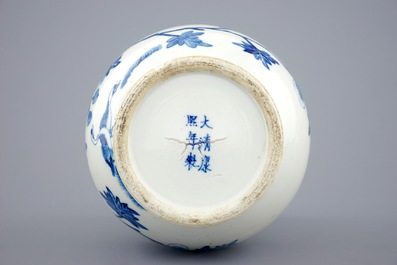 A Chinese blue and white vase with ruyi handles and a Kangxi-style plate, 19th C.